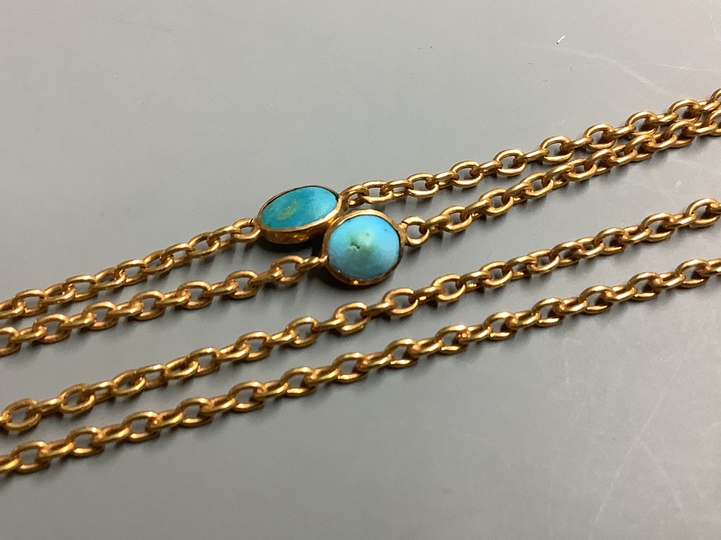 A 9ct and seven stone cabochon turquoise set long chain